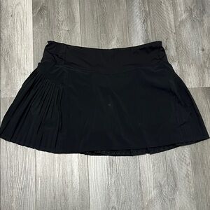 Athleta women’s pleated golf skirt/ black / size L